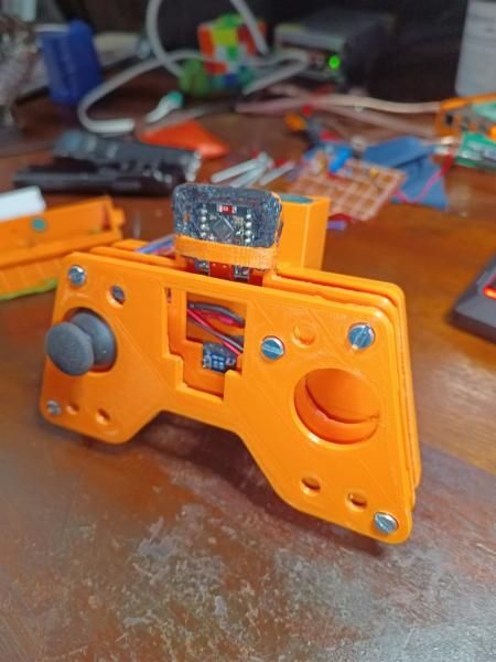 An earlier fit-up of the remote from the front, with one thumbstick fitted