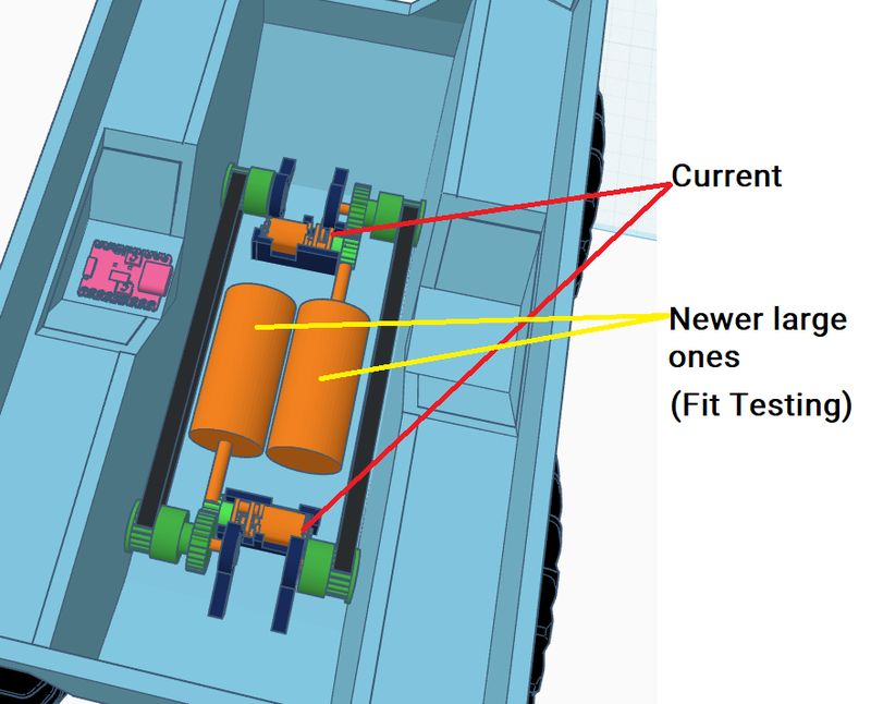 Tinkercad render comparing the current small motors with newer, larger ones being fit-tested inside the body